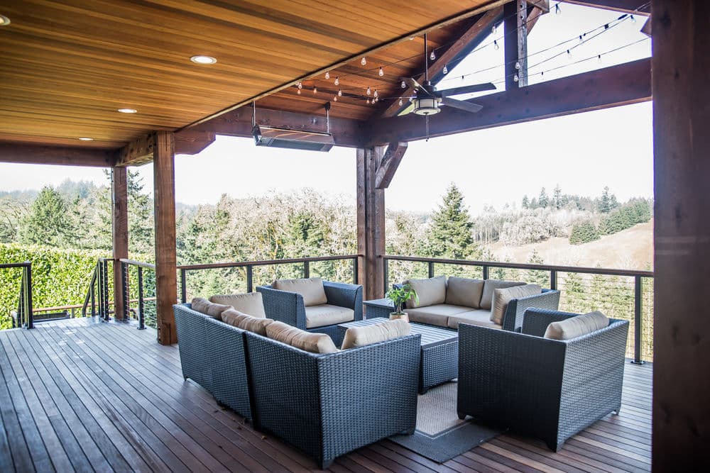 Cozy outdoor living space with seating and scenic views, perfect for relaxation.