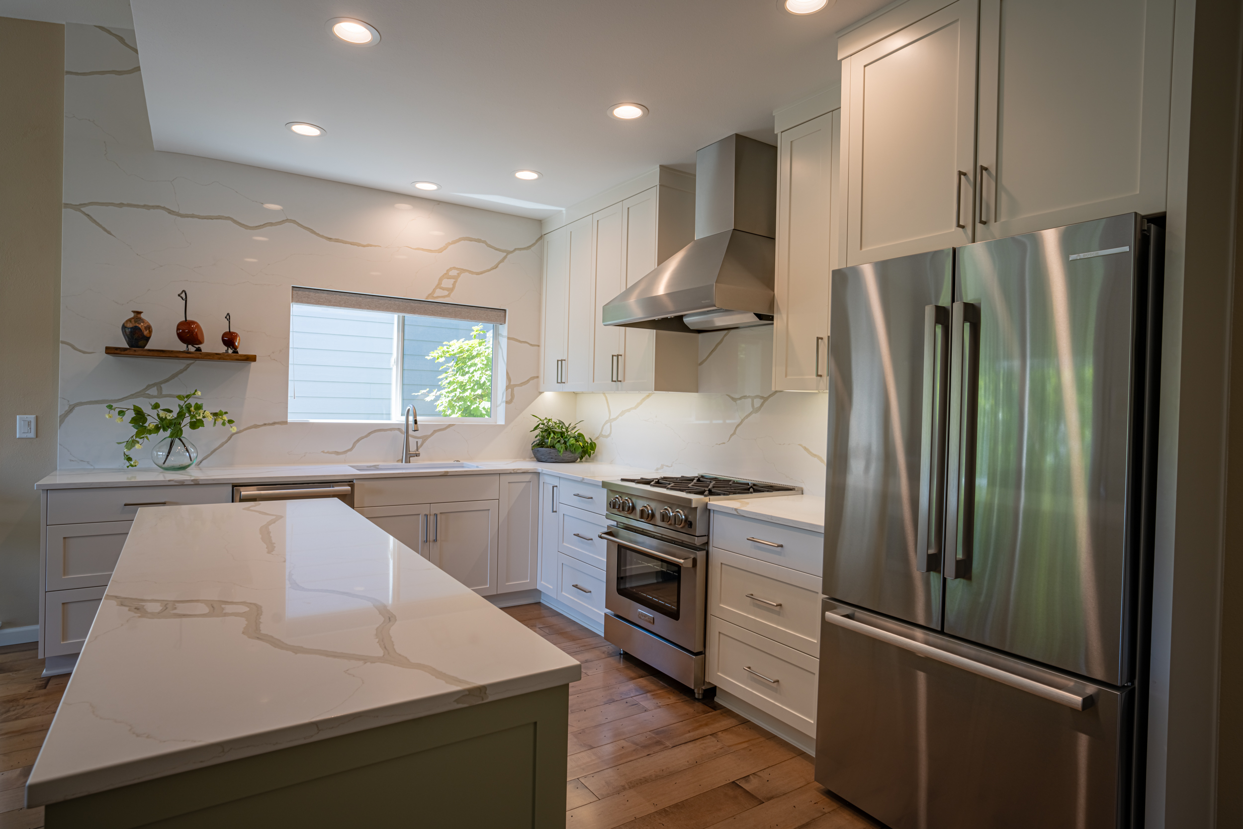 a stainless steel refrigerator in a kitchen